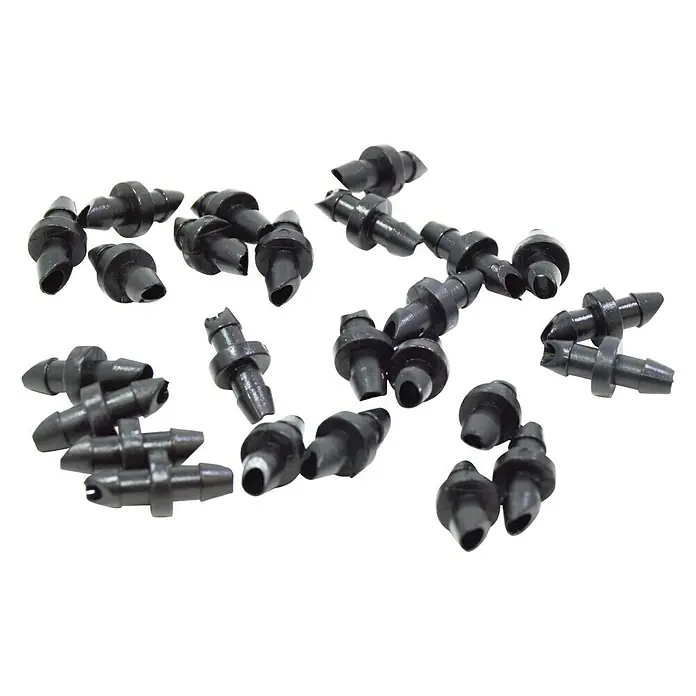 Acoplamiento de manguera de microgoteo - 4 mm, 25 ud. - Primer plano de accesorios de riego negros diseñados para sistemas de riego de precisión.\n