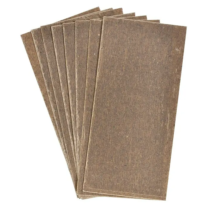 Firefix Anzünder - Papier, 100 Stk. - Ein Stapel rechteckiger, brauner Dämmplatten. Das Material wirkt rau und faserig. Geeignet für Wärme- oder Schallschutz im Bauwesen.