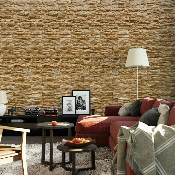 Revestimiento de piedra Galicia - Bronce, Cantidad total: 4 pzs. - Una foto de una sala de estar que muestra una pared adornada con paneles de pared decorativos con aspecto de piedra que crean un ambiente rústico.
