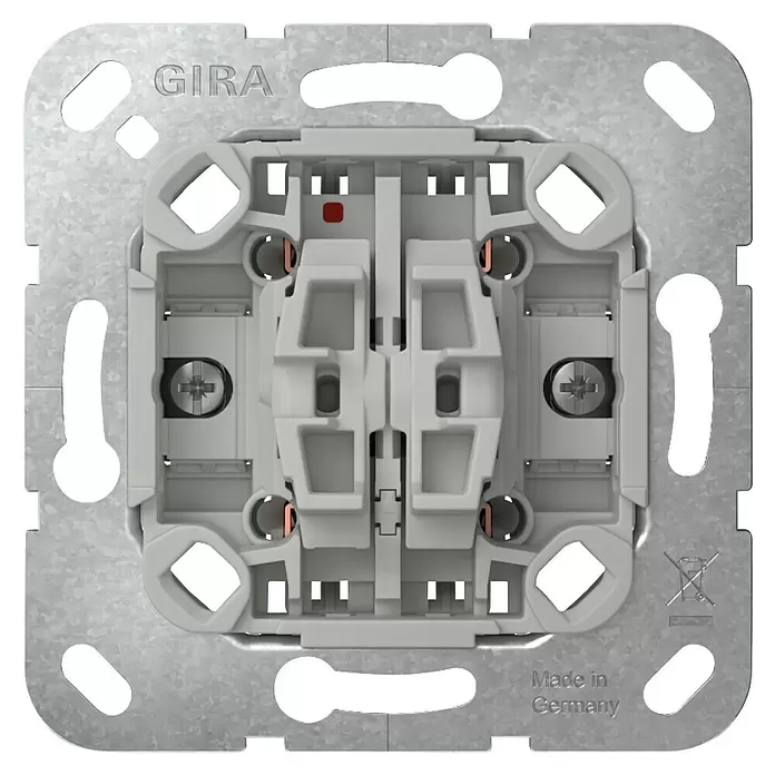 Gira Jalousieschalter-Einsatz 315900 - 10 A, Unterputzmontage - Rückansicht eines GIRA Lichtschaltereinsatzes, graues Kunststoffgehäuse mit Metall-Montagerahmen und Anschlussklemmen.