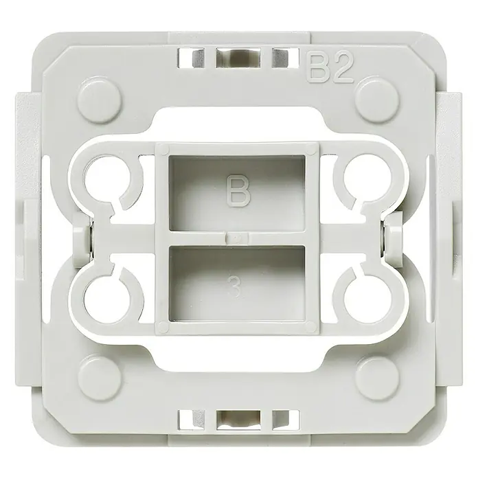Homematic IP Adapter EQ3-ADA-B2 - 1 Stk., Passend für: Berker-Schalter S1/Modul2/B1/B3/B7/Q1/Q3/Q7 - Nahaufnahme einer weißen Montageplatte für einen Lichtschalter. Das Produkt ist aus robustem Kunststoff gefertigt.