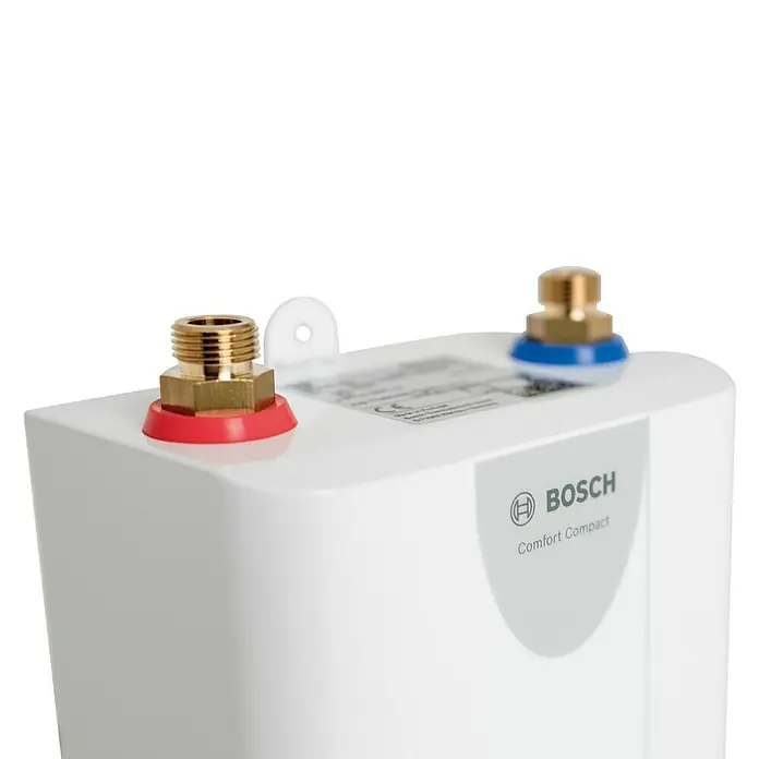 Bosch Kleindurchlauferhitzer Tronic Comfort - 3,6 kW, 1,8 l/min - Nahaufnahme eines Bosch Comfort Compact Warmwasserbereiters mit Anschlüssen für Warm- und Kaltwasser.