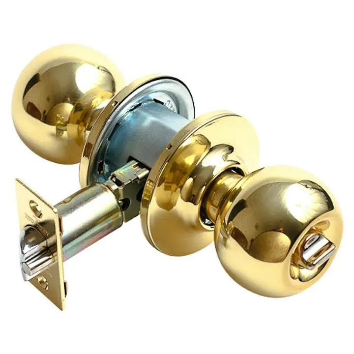 Tesa Assa Abloy Pomo giratorio 3900LP - Latón, Pulido - Primer plano de un pomo de puerta dorado que muestra su acabado brillante y los detalles mecánicos.