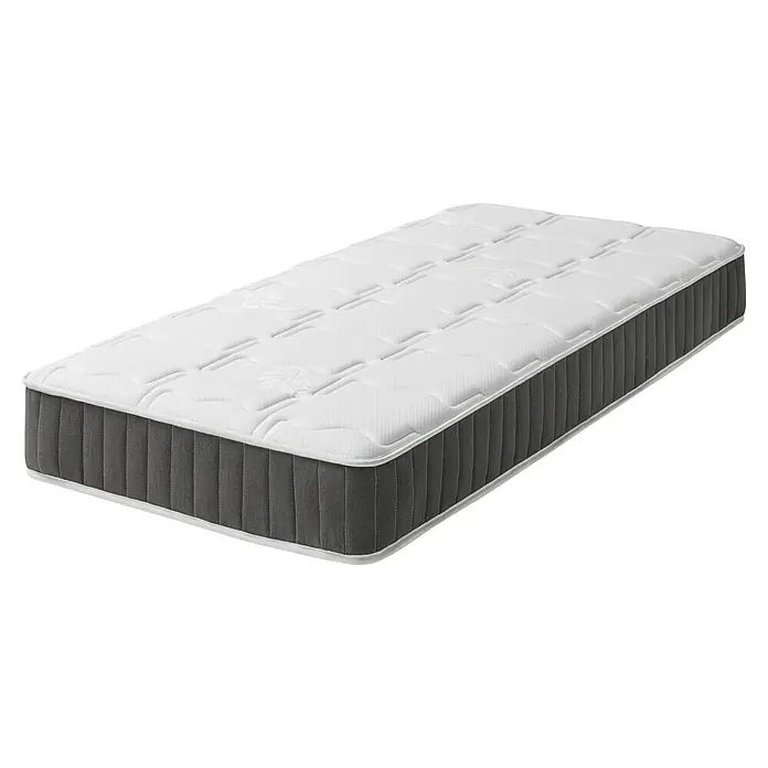 Unique Colchón Indo - Largo: 190 cm, Ancho: 135 cm, Altura: 22 cm, Núcleo de muelles - Primer plano de un colchón de alta calidad con superficie acolchada y borde gris, perfecto para un descanso reparador.
