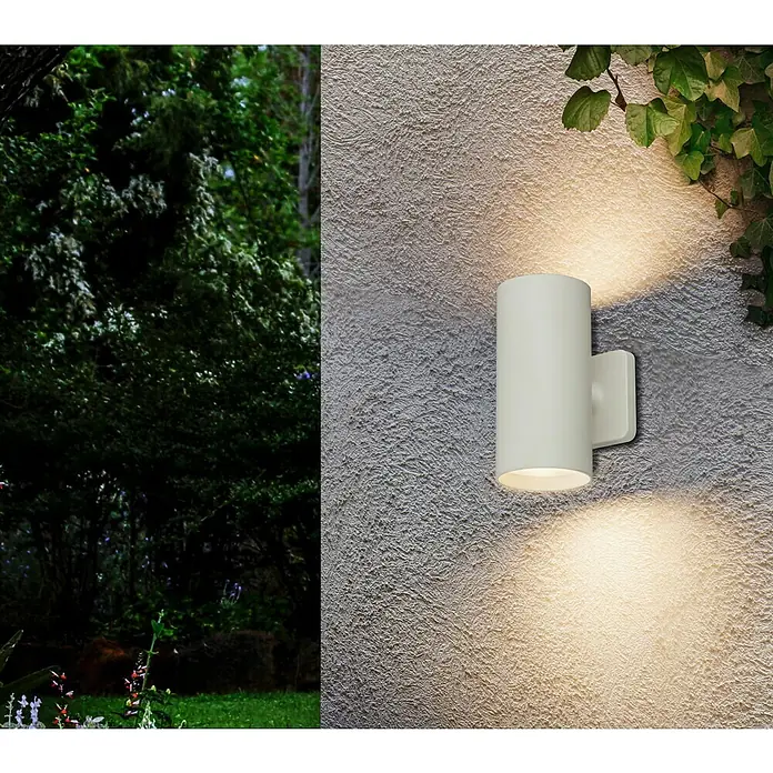 Starlux Akku-Wandleuchte Avio - 2,6 W, 7,1 x 5,3 x 11 cm, IP44, Matt Weiß - Nahaufnahme einer modernen, weißen Wandleuchte, die sowohl nach oben als auch nach unten Licht abgibt und die Umgebung beleuchtet.