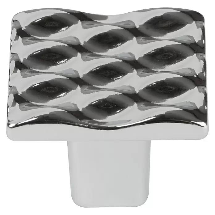 Walteco Möbelknopf Wave - L x B x H: 25 x 25 x 20 mm, Sonstige, Verchromt - Glänzender rechteckiger silberner Knopf mit gewellter Oberfläche und weißem Sockel.