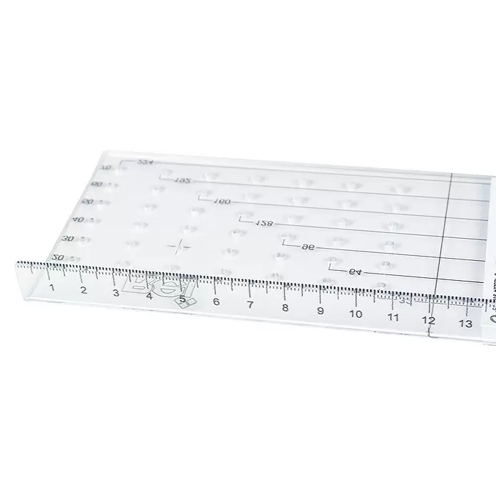 Rei Bohrschablone - L x B x H: 240 x 83 x 18 mm, Transparent - Transparentes Lineal aus Kunststoff mit schwarzen Maßeinheiten und Zahlen von 1-13 cm sowie zusätzlichen Skalen und Noppen.