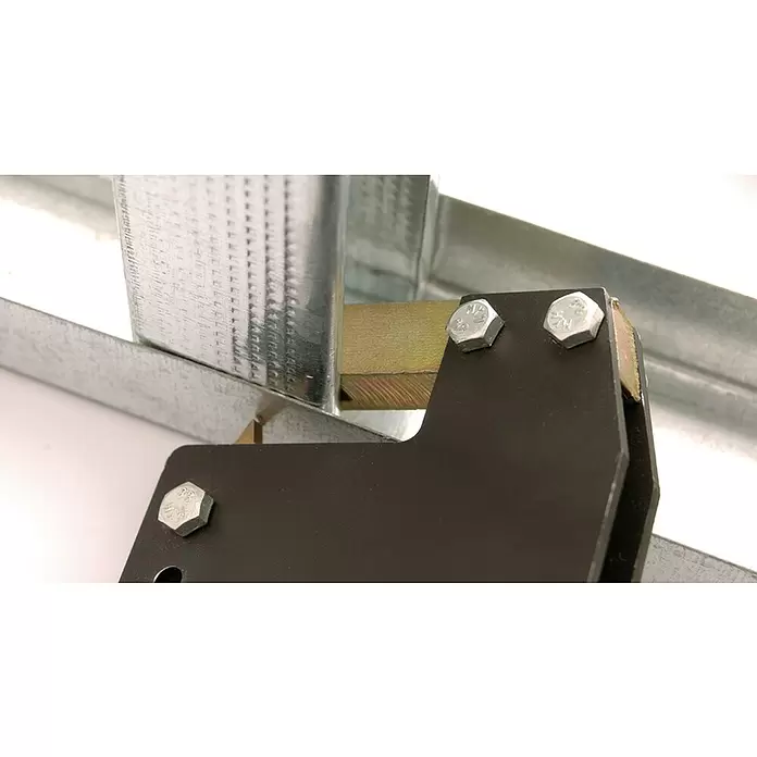 Mondelin Profilverbundzange - Länge: 27 cm - Dunkle Metallhalterung mit Sechskantschrauben sichert verzinktes Stahlprofil, mit gelbem Metalleinsatz.