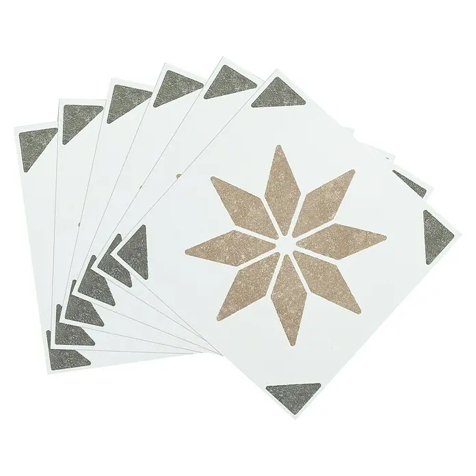 D-c-fix Fliesensticker Wall Tiles Alia - 6 Stk., 15 x 15 cm, Olive - Stapel quadratischer weißer Fliesen mit zentralem Sternmuster in Beige und Eckdreiecken in Grau.