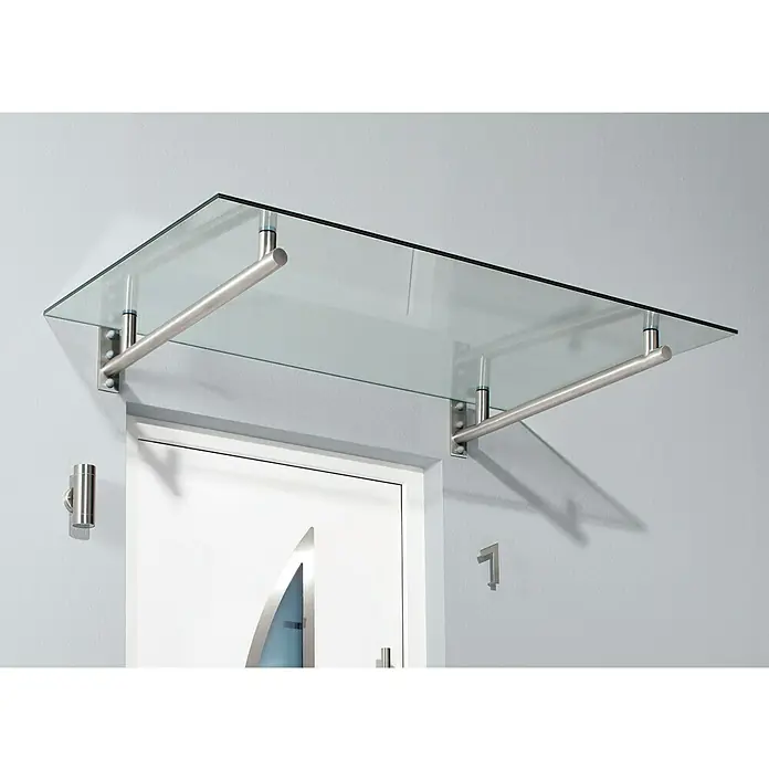 Gutta Vordach HD - 160 x 100 x 19,5 cm, Edelstahl - Eine elegante Glasvordach mit Edelstahlhalterungen über einer weißen Tür, die ein modernes und stilvolles Design aufweist.