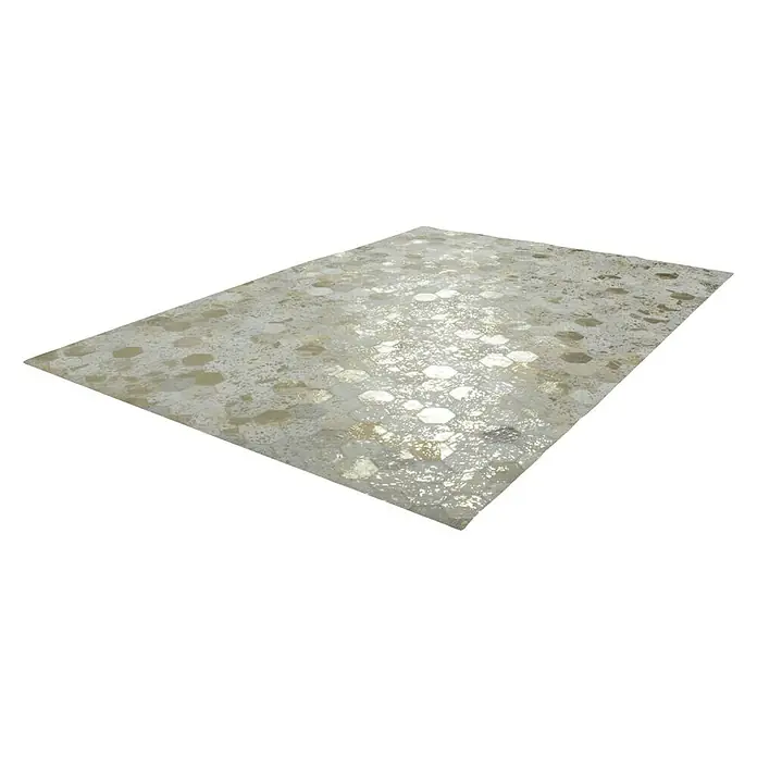 Kayoom Lederteppich Dazzle 200 - Elfenbein/Gold, 170 x 120 cm, 100 % Leder - Heller Teppich mit sechseckigem Muster. Der Teppich ist hell und mit einem geometrischen Muster versehen, das für einen modernen Look sorgt.