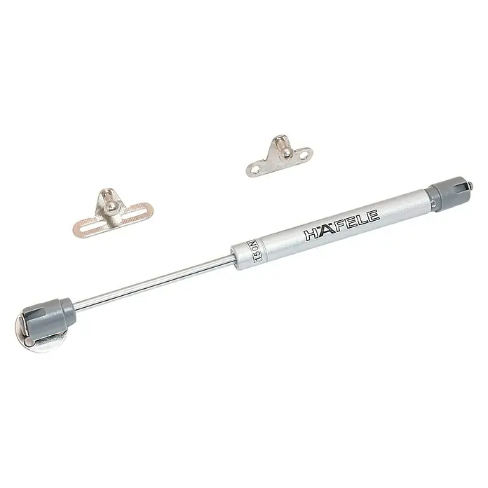Suki Muelle de compresión 150N - Largo: 26,7 cm, índice de rigidez: 150 N - Herraje para muebles Haefele: Muelle de gas y dos soportes de montaje para puertas o solapas de armarios.