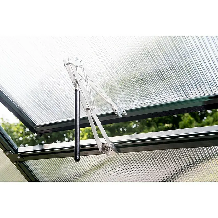KGT Automatischer Fensteröffner - Passend für: KGT Gewächshäuser - Nahaufnahme einer Gewächshausluke mit automatischem Fensteröffner, der für optimale Belüftung und Temperaturkontrolle im Inneren sorgt.