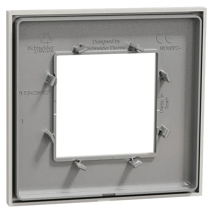 Schneider Electric New Unica Marco - Gris cava, Plástico, Colocar - Primer plano de una placa frontal cuadrada de Schneider Electric con un marcado CE y una inscripción "Made in Spain".