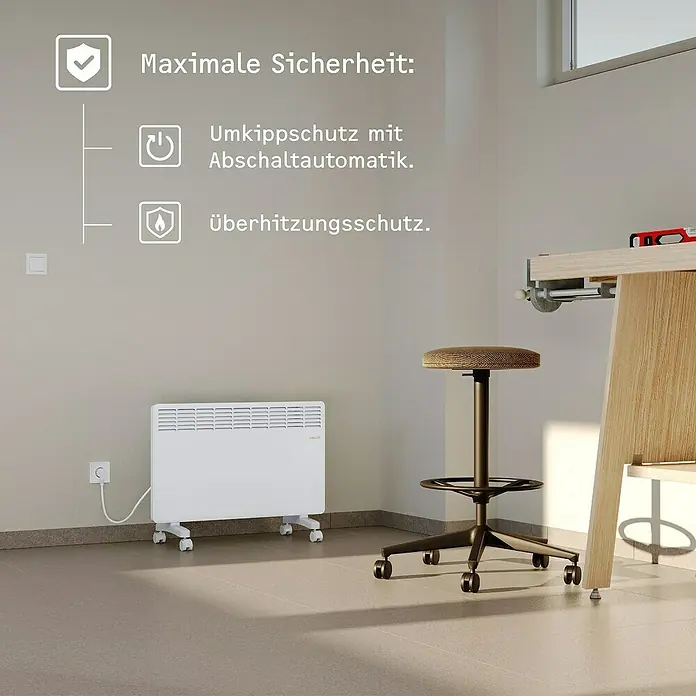 Stiebel Eltron Konvektorheizung - 2.000 W, Raumheizvermögen: 25 m², Weiß - Das Bild zeigt einen weißen Heizkörper mit Rollen und Hinweisen zur Sicherheit, darunter Umkippschutz und Überhitzungsschutz.