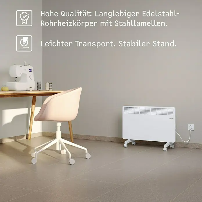 Stiebel Eltron Konvektorheizung - 2.000 W, Raumheizvermögen: 25 m², Weiß - Eine Nahaufnahme eines weißen elektrischen Heizkörpers mit Stahlrippen, der auf Rollen steht und einen einfachen Transport ermöglicht.