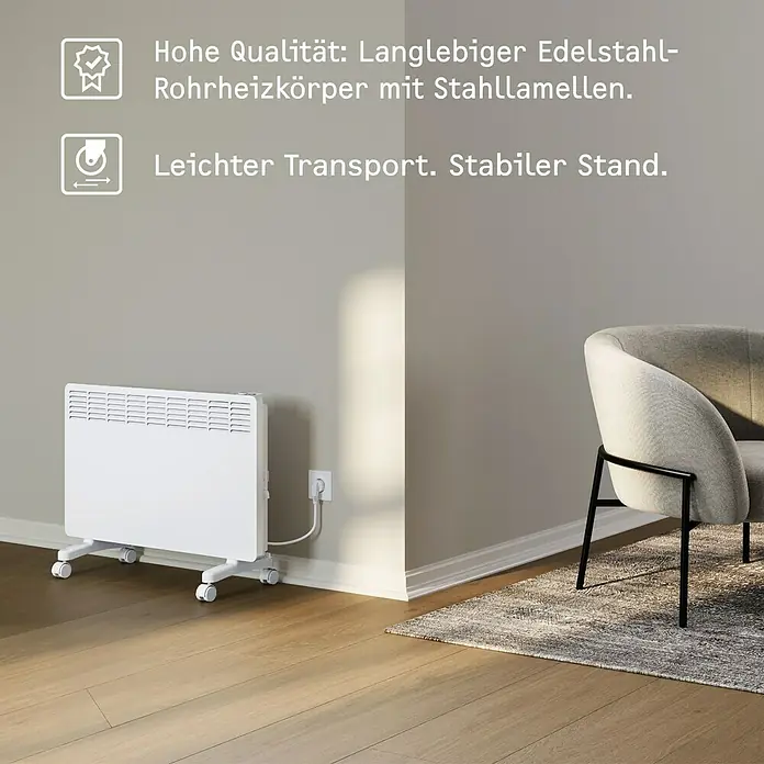 Stiebel Eltron Konvektorheizung EG-50-PL2-PE - 2.000 W, Raumheizvermögen: 25 m², Weiß - Bild eines weißen, mobilen Heizkörpers mit Edelstahl-Rohrheizkörper und Stahllamellen in einem Wohnraum.