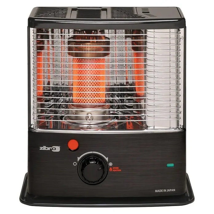 Toyotomi Estufa de parafina Zibro RS30 - 3 kW, Volumen del depósito: 4 l, Negro - Primer plano de un calentador de queroseno portátil Zibro fabricado en Japón, con rejilla de seguridad y mandos.