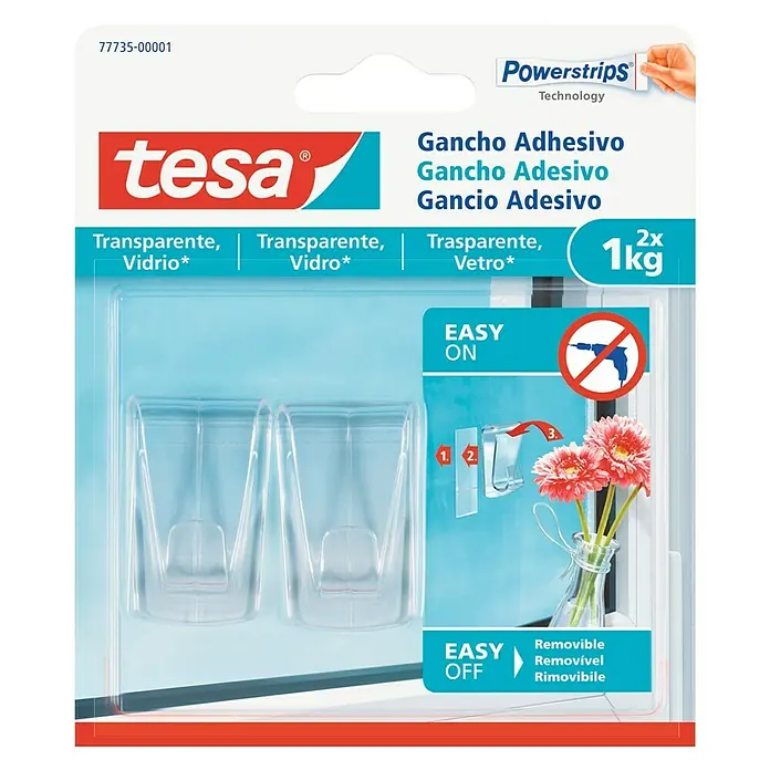 Tesa Colgador adhesivo - Transparente, Carga soportada: 1 kg, 2 ud. - Embalaje del producto ganchos adhesivos Tesa Powerstrips, transparentes, para superficies de vidrio, hasta 1 kg de capacidad, fácil de montar sin taladro.