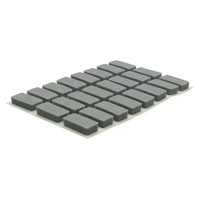 Wagner System Softpads - L x B x H: 16 x 8 x 4 mm, 24 Stk., Grau, Kleben - Graue rechteckige filzartige Polster in einem Gitter angeordnet.