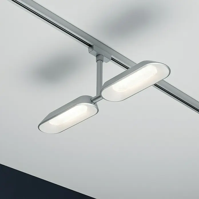 Paulmann URail Regleta LED para riel Dipper - 16 W - Primer plano de una moderna luminaria LED montada en riel en plata, que ofrece luz brillante y direccional para espacios interiores.