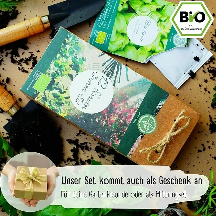 Kräutersamen Set - 12 Stk., verschiedene Kräuter - Ein braunes Kräutersamen-Set für 12 Kräuter, mit Schnur gebunden, umgeben von Gartengeräten und Erde. Auch als Geschenk geeignet.