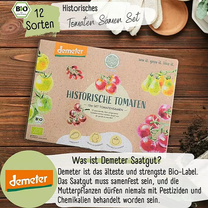 Gemüsesamen Demeter Historisches Tomaten - 12 Stk., Solanum lycopersicum, Erntezeit: Juli - Demeter 'Historisches Tomaten Samen Set' (12 Sorten) Box mit Illustrationen und Text zu Demeter Saatgut, auf Holztisch.