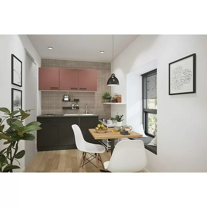 Optifit Nizza407 Singleküche Typ 1 - Breite: 150 cm, Anthrazit/Rostrot, Mit Elektrogeräten - Moderne Küche mit dunkelgrauen Unter- und rosa-roten Hängeschränken, Arbeitsplatte und integriertem Essbereich.