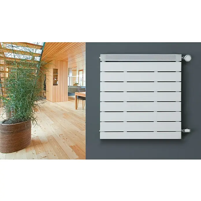 Ximax Designheizkörper Pep - B x H: 500 x 500 mm, Wärmeleistung bei Vorlauftemperatur von 75 °C (D: 50): 242 W - Ein modernes, weißes Heizpaneel an einer grauen Wand, das Wärme und Stil in jedes Zuhause bringt.
