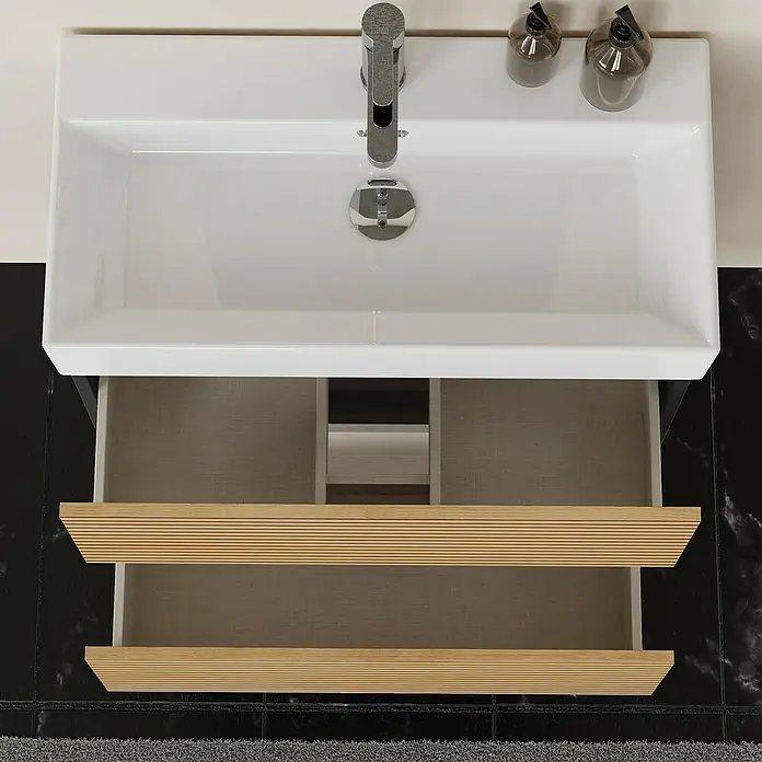 Conjunto de mueble de baño Osaka Slim - 70 cm, Negro/Nogal, 2 pzs. - La foto muestra un moderno lavabo de baño con un mueble abierto. El lavabo es blanco y rectangular, y el mueble es de madera.