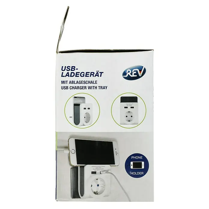 REV USB-Ladegerät Zwischenstecker - Weiß, 2 USB-Anschlüsse - Das Foto zeigt die Verpackung eines REV USB-Ladegeräts mit Ablageschale, ideal zum Aufladen von Mobilgeräten.