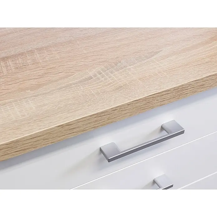 Flex-Well Samoa Singleküche - Breite: 210 cm, Weiß/Braun, Mit 2-Zonen-Glaskeramikkochfeld - Detailaufnahme einer Kommode mit hellbrauner Holzplatte und weißen Schubladen mit silbernen Griffen.