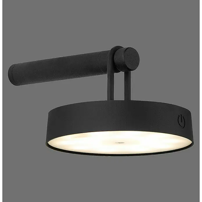 Just Light Aplique de pared con batería Arma - 12,8 x 19 x 8,7 cm, Negro, Blanco cálido, 15 W, IP44 - Primer plano de una lámpara de pared negra moderna con una pantalla redonda que emite una luz cálida. Iluminación funcional.