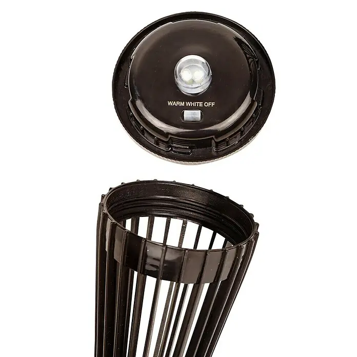 Arte confort Baliza exterior LED Cosmi - Blanco frío - Primer plano de una lámpara antimosquitos recargable con luz UV y luz blanca cálida, perfecta para uso interior y exterior.