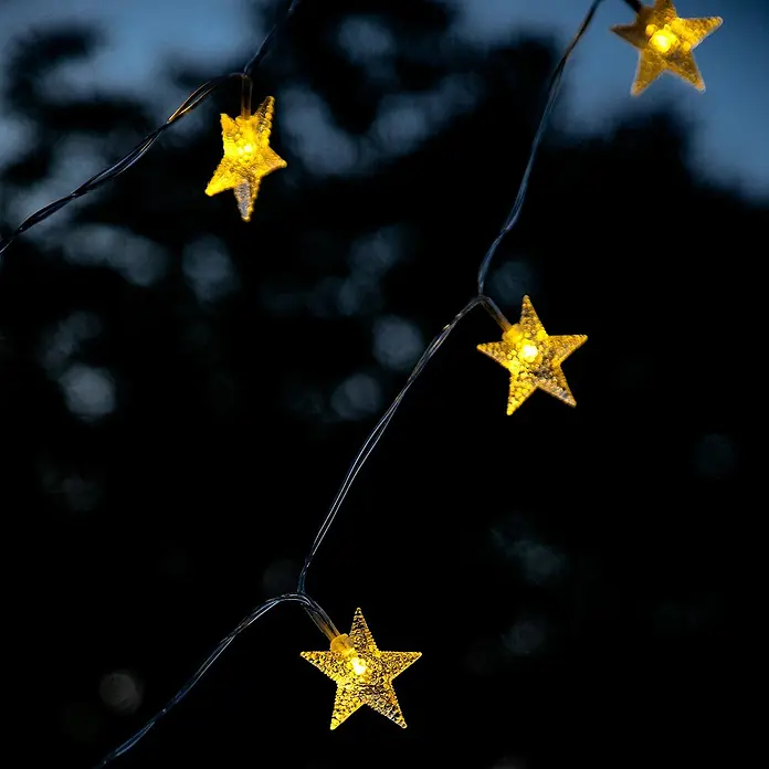 Arte confort Lámpara decorativa solar Astris - Para exterior, 635 cm, Blanco cálido - Guirnalda de luces atmosférica con estrellas brillantes. Perfecta para veladas acogedoras y decoraciones festivas. Crea un ambiente cálido.