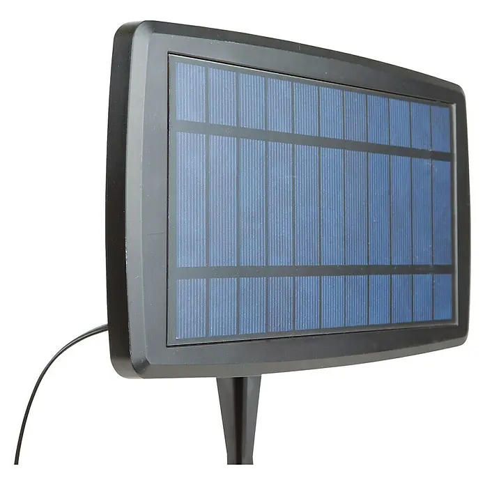 Arte confort Lámpara decorativa solar Glimia - Para exterior, 785 cm, Blanco cálido - Primer plano de una luz solar rectangular con marco negro y células solares, colocada en una habitación oscura.