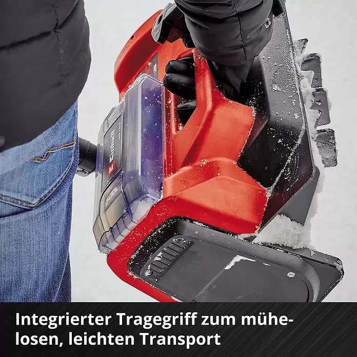 Einhell Power X-Change 18V Akku-Schneefräse GE-ST 36/40LI E - 36 V, Ohne Akku, Arbeitsbreite: 40 cm - Person trägt eine rote und schwarze akkubetriebene Schneeschaufel/Schneefräse mit integriertem Griff, teilweise mit Schnee bedeckt.