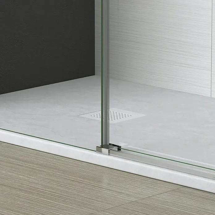Torvisco Plato de ducha Extraflat - L x An: 70 x 120 cm, Material compuesto, Blanco - Vista detallada de una cabina de ducha moderna con panel de vidrio, desagüe y azulejos elegantes, mostrando un diseño de baño elegante.