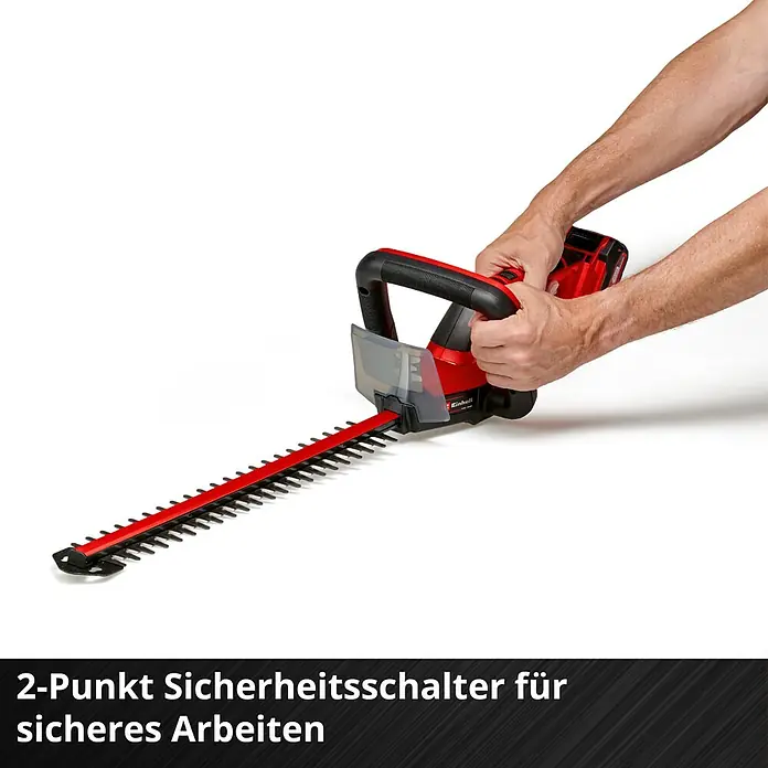 Einhell Power X-Change 18V Akku-Heckenschere GC-CH 18/50 Li-Solo - 18 V, Li-Ionen, Ohne Akku, Schnittlänge: 50 cm - Akkubetriebene Heckenschere in Aktion, gehalten von zwei Händen, mit Sicherheitsvorrichtung für sicheres Arbeiten.