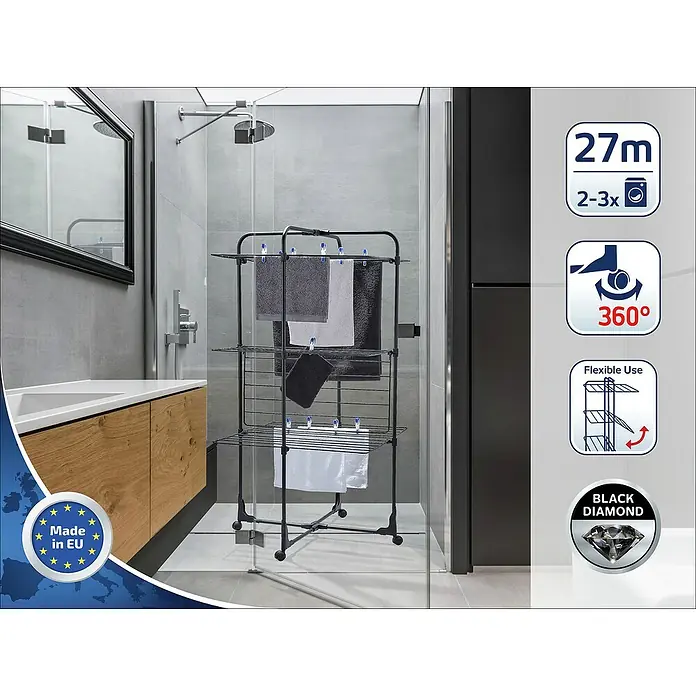 Leifheit Turm-Wäscheständer ClassicTower 270 Black - Länge Wäscheleine: 27 m, L x B x H: 68 x 68 x 126 cm, Schwarz - Ein stilvolles Badezimmer mit einem schwarzen, dreistöckigen Wäscheständer mit Handtüchern, der Platz und Funktionalität vereint.