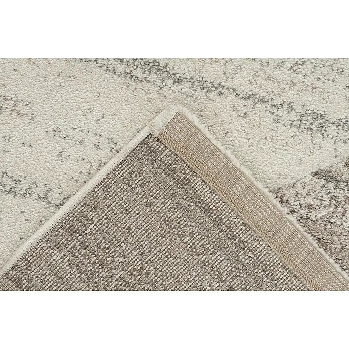 Kurzflorteppich Trendy Carving - Beige/Silber, 150 x 80 cm, 100 % Polypropylen - Detailansicht eines beigefarbenen Teppichs mit meliertem Muster, der die Textur und Verarbeitung des Produkts hervorhebt.