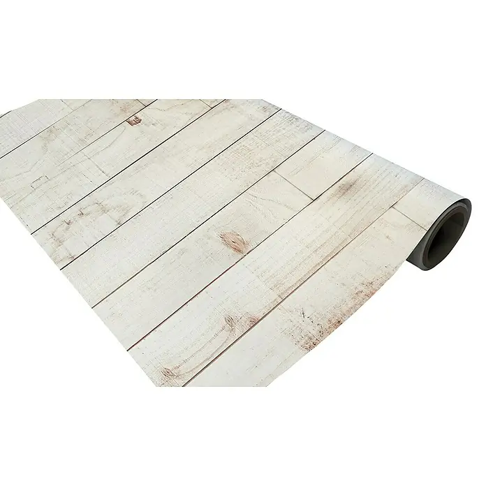 Papel pintado de vinilo autoadhesivo Madera - Blanco, L x An: 280 x 65 cm - Primer plano de un fondo enrollado con un diseño de tablones de madera clara, ideal para fotografía de productos y presentaciones rústicas.