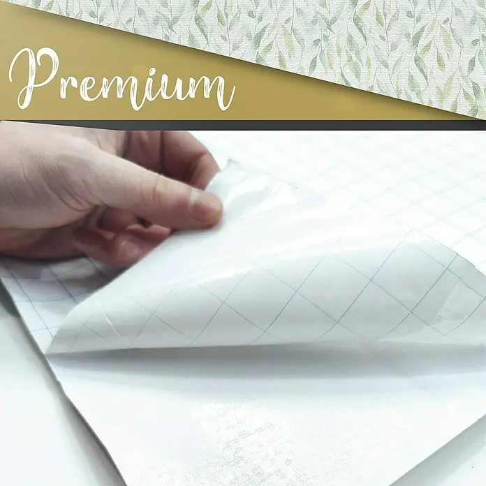 Lámina decorativa autoadhesiva vinílico Premium - 90 x 280 cm, Sauce, Verde - Primer plano de un rollo de etiquetas adhesivas premium con una cuadrícula para facilitar el corte y la aplicación a las superficies.