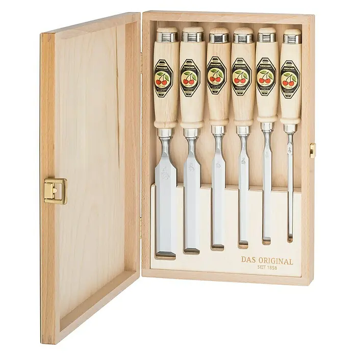 Kirschen Stechbeitelsatz - 6 -tlg. - Ein Set mit sechs Kirschen Stecheisen in einer Holzbox. Die Stecheisen haben Holzgriffe und sind mit einer Kirschenmarke versehen.