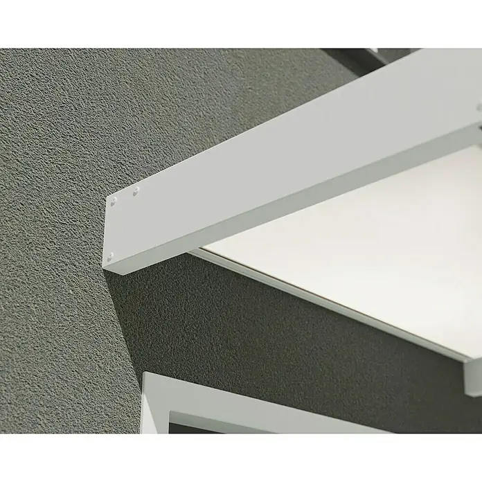 Palram – Canopia Pultvordach Sophia - 215 x 95 x 17 cm, Weiß, Farbe Dach: Opal - Nahaufnahme einer modernen weißen Markise an einer strukturierten grauen Wand, die architektonische Details und saubere Linien hervorhebt.