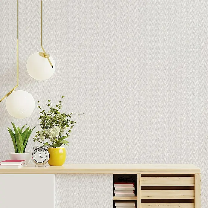 Lámina decorativa autoadhesiva vinílico Premium - 90 x 280 cm, Calma, Blanco - Primer plano de una elegante cómoda con decoración y lámparas modernas, creando un ambiente acogedor.