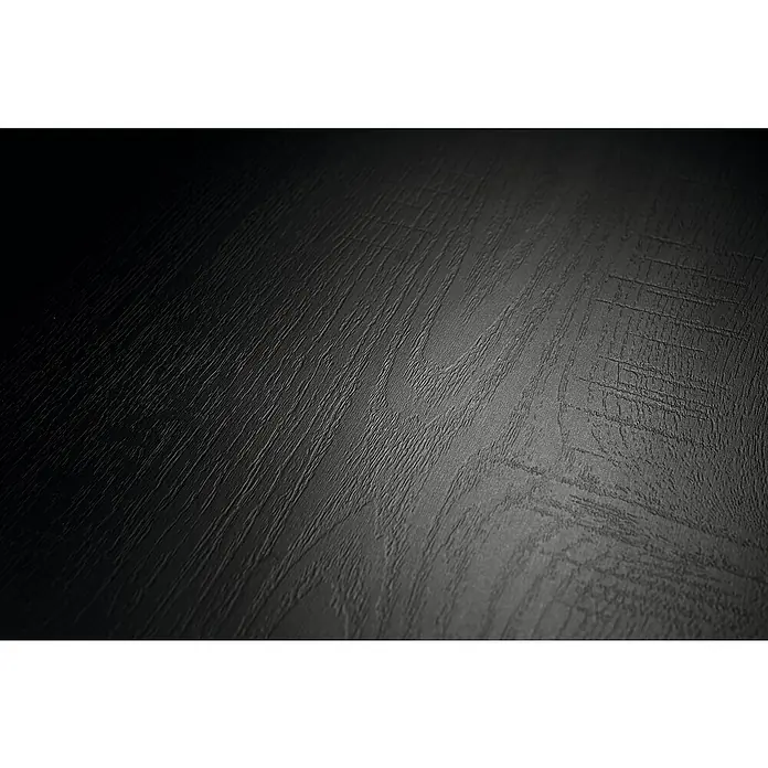 Egger Laminat NatureSense - Bardolino Eiche grau, Landhausdiele, 1.292 x 193 x 7 mm - Nahaufnahme einer eleganten, strukturierten, schwarzen Tischplatte, die eine raffinierte Oberfläche und ein schlichtes Design aufweist.
