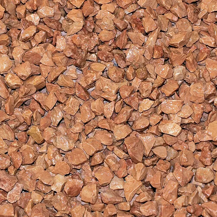 Hamann Mercatus Marmorsplitt - Roso Verona, Körnung: 9 mm - 12 mm, 1.000 kg - Nahaufnahme von rotbraunen Zierkieseln. Ideal für Gartenwege, Rabatten und als dekoratives Element im Außenbereich.