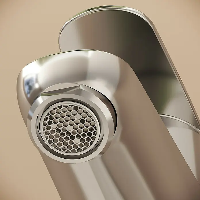 VitrA Flow Round Waschtischarmatur - Höhe: 15 cm, Ausladung Armatur: 114 mm, Chrom, Mit Zugstange - Nahaufnahme eines modernen, verchromten Wasserhahnauslaufs mit sechseckigem Siebeinsatz.