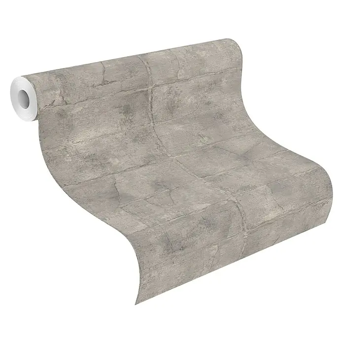 Rasch Selection Vliestapete Mauerwerk - Steingrau, Steinoptik, 10,05 x 0,53 m - Graue Tapetenrolle mit Betonblockmuster, teilweise abgerollt.